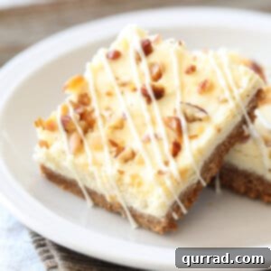 Spiced Eggnog Cheesecake Squares 5 eggnog cheesecake bars on plate