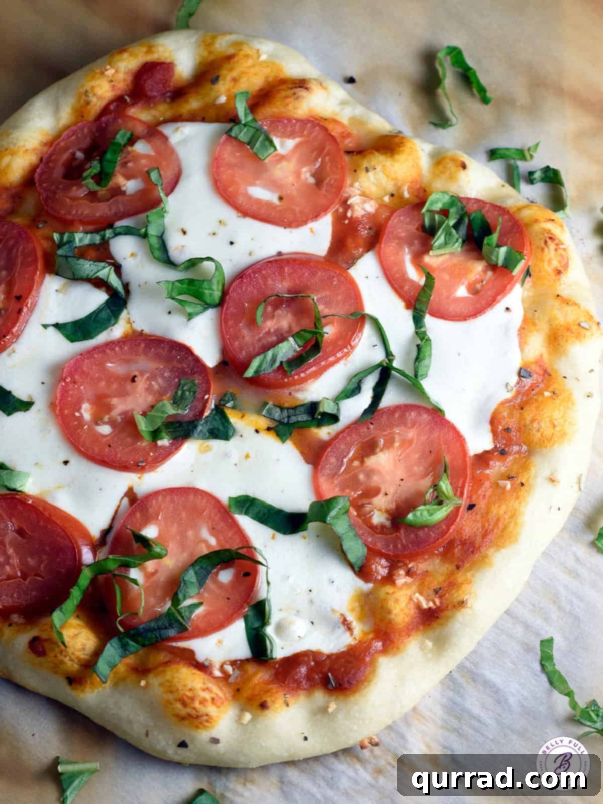 A vibrant Margherita pizza, generously topped with fresh tomatoes, melted mozzarella, and fragrant basil leaves, showcasing a perfectly baked crust.
