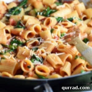 One Pot Italian Pasta featured in recipe card, garnished with fresh basil