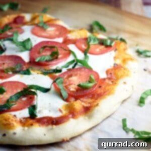 Made with fresh marinara sauce, mozzarella cheese, and basil, Margherita pizza is simple, classic, so easy, and absolutely delicious!