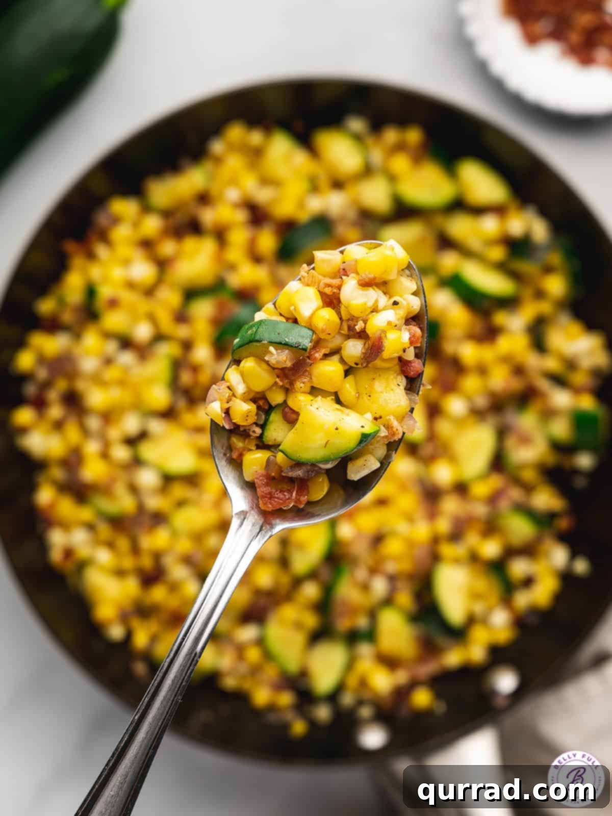 Summer Zucchini Corn Medley 4 spoonful of zucchini and corn saute