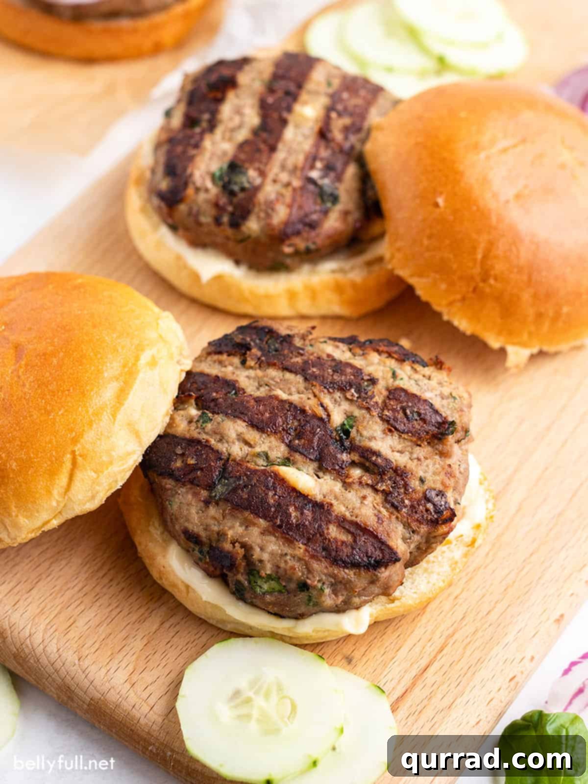 Succulent Turkey Burgers 5 grilled burger on bun sitting on cutting board