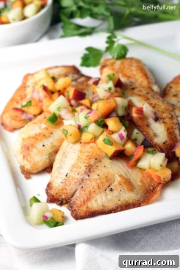 Golden Seared Tilapia with Vibrant Peach Cucumber Salsa 2 Pan Seared Tilapia fillets are topped with a fresh, bright, and simple peach and cucumber salsa. Delicious 30 minute meal!