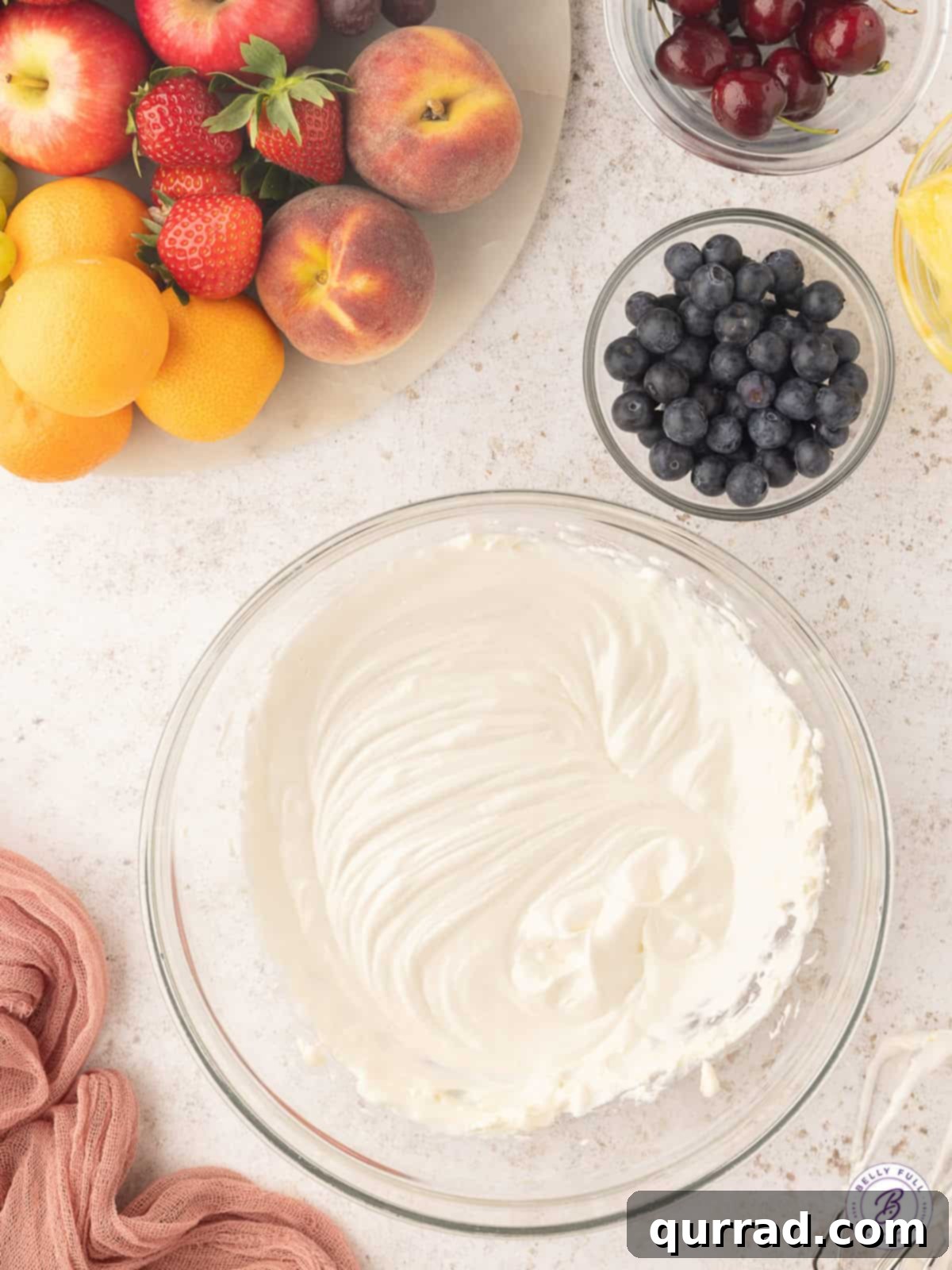 Velvety Gourmet Fruit Medley 3 whipped cream cheese dressing in bowl