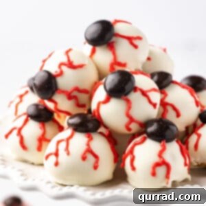 Pile of Halloween bloodshot eyes chocolate candy on serving tray