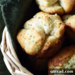 monkey bread muffins in bread basket with green napkin