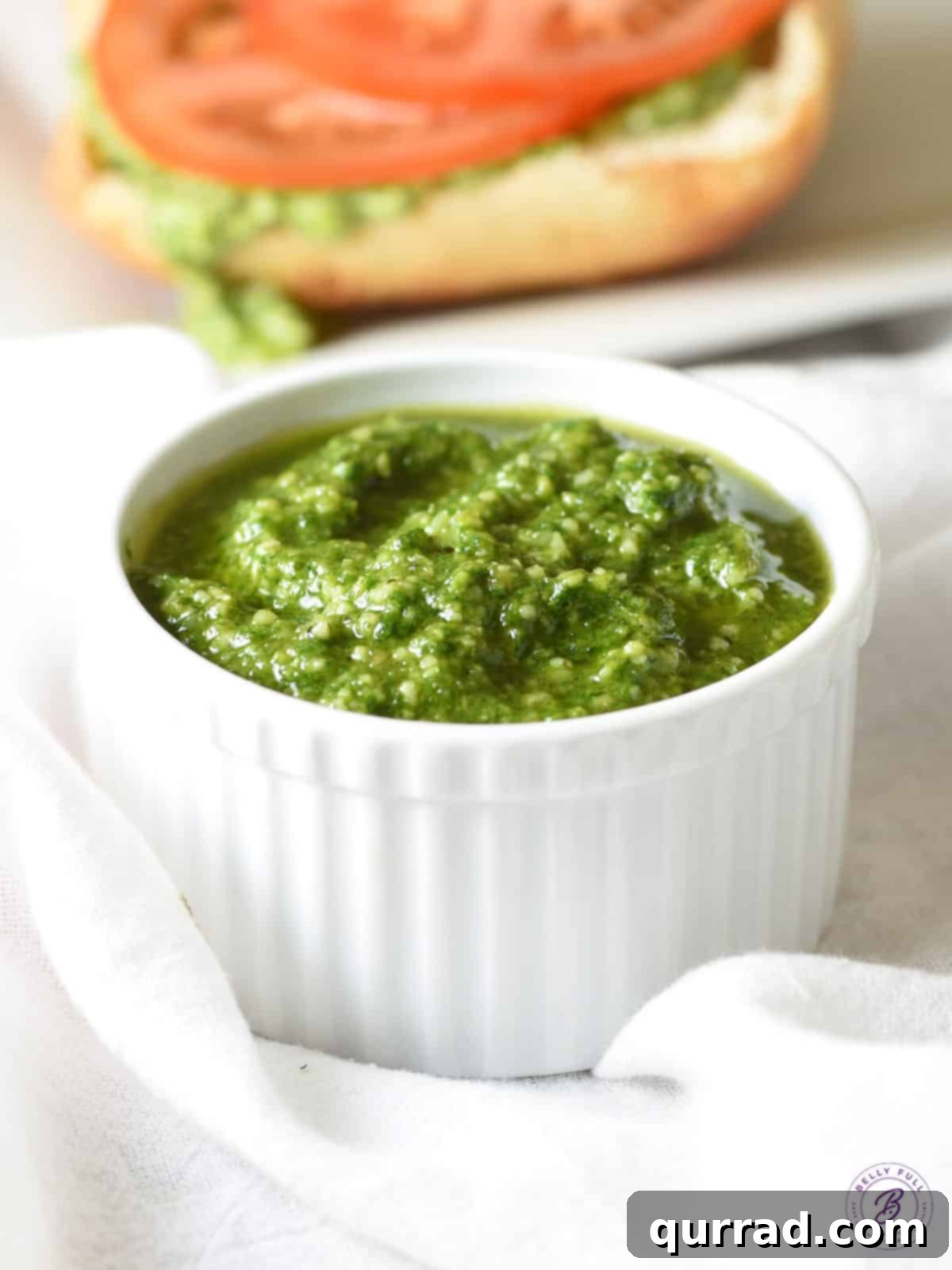 Vibrant Basil Pesto 2 ramekin filled with pesto, showcasing its vibrant green color and fresh texture