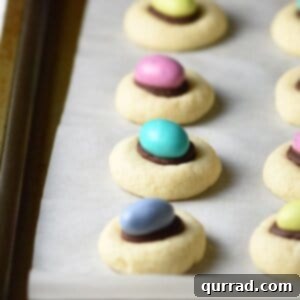 Effortless Easter and Spring Delights 8 Easter Egg Thumbprint Cookies with chocolate ganache and M&M eggs