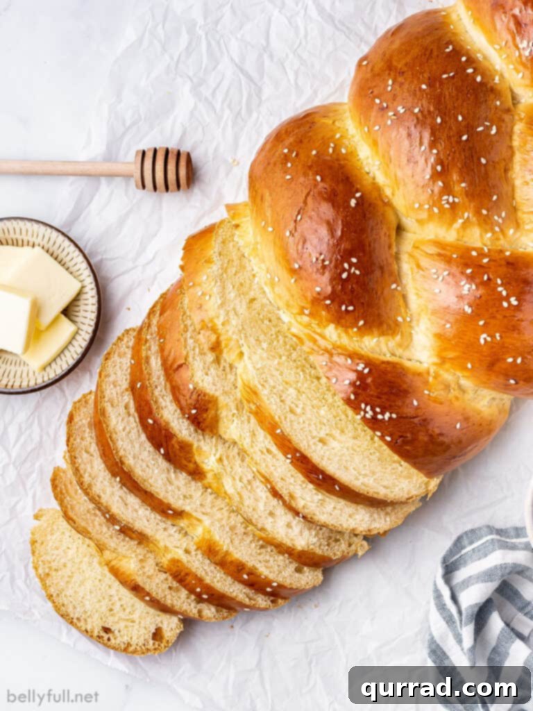 Golden Braided Challah 5 sliced loaf of challah