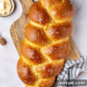 overhead whole loaf of 3 strand braided challah bread