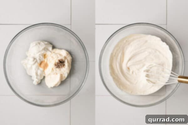 Mayonnaise, sour cream, and seasonings mixed in a bowl, forming the creamy base.