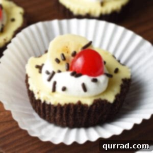 banana split mini cheesecake on top of paper liner