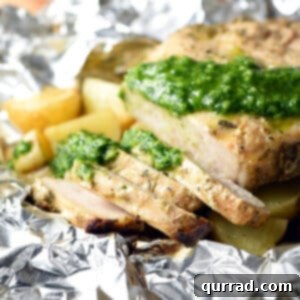 Grilled Pork Chops: Foil Packet Perfection 5 Sliced grilled pork chop with Chimichurri sauce, a complete and delicious meal.