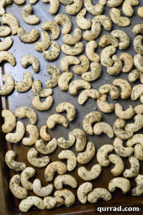 dill pickle cashews on baking sheet