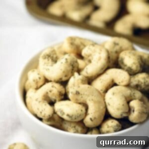 Easily transform plain cashews into Dill Pickle Cashews with herbs, buttermilk powder, and tangy citric acid. Makes a healthy, delicious, and awesome portable snack!
