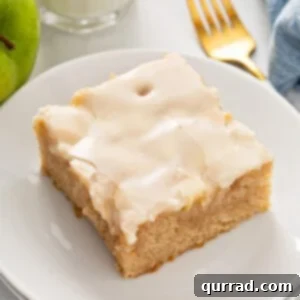 square slice of caramel apple sheet cake on plate