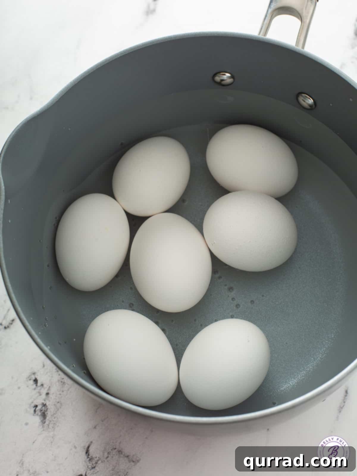 large eggs in pot of water