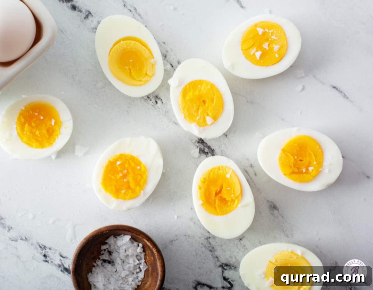 overhead hard boiled eggs cut in half sprinkled with salt