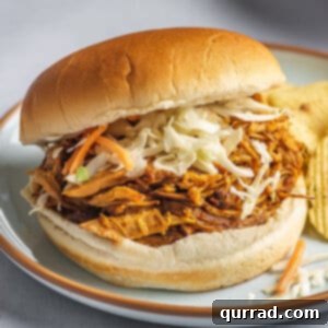 Set-and-Forget BBQ Chicken 6 Close-up of a bbq pulled chicken sandwich