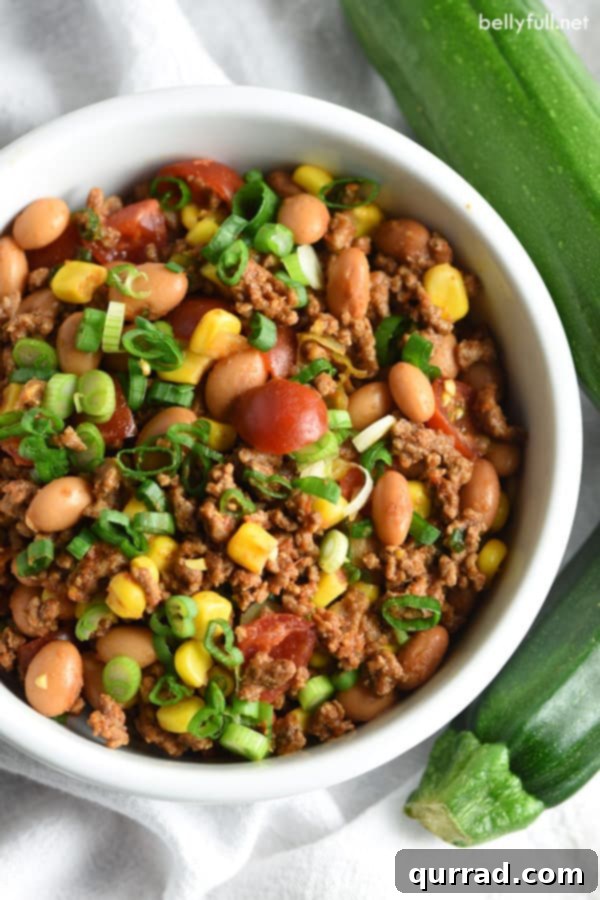 Rich and savory filling for Zucchini Taco Boats in a white bowl