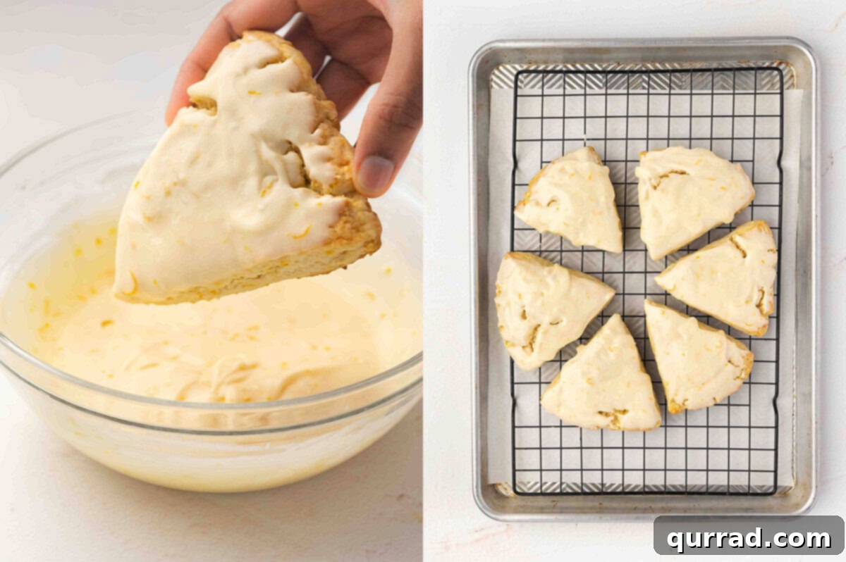 Glazing the Orange Creamsicle Scones Dipping the top of a baked scone into a bowl of orange glaze