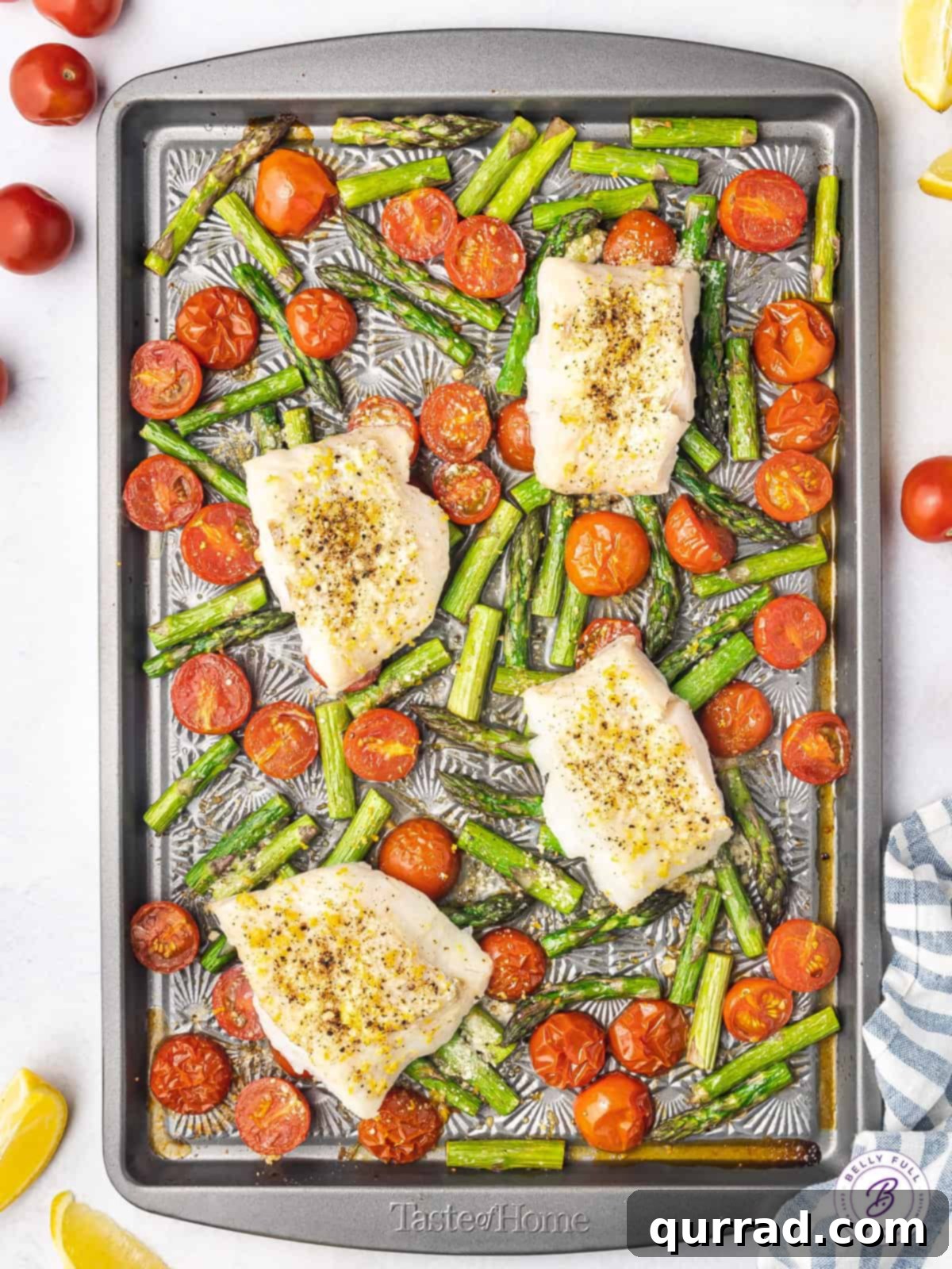 One Pan Wonder Baked Cod 3 sheet pan of baked white fish over roasted tomatoes and asparagus