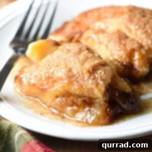 golden-baked apple dumplings in a baking dish