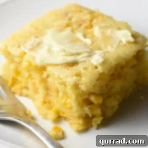 portion of cornbread pudding on white plate