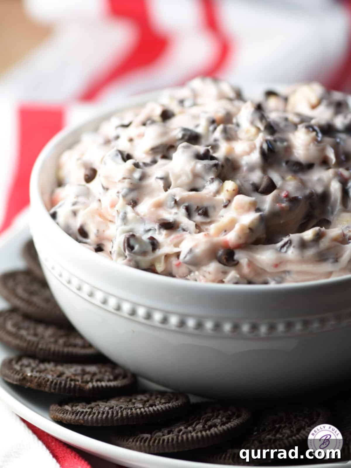 peppermint bark dip in white bowl