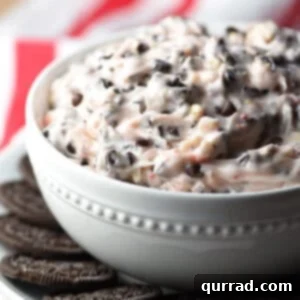 peppermint bark dip in white bowl