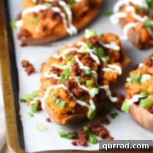 twice baked sweet potato with chorizo and sour cream drizzle