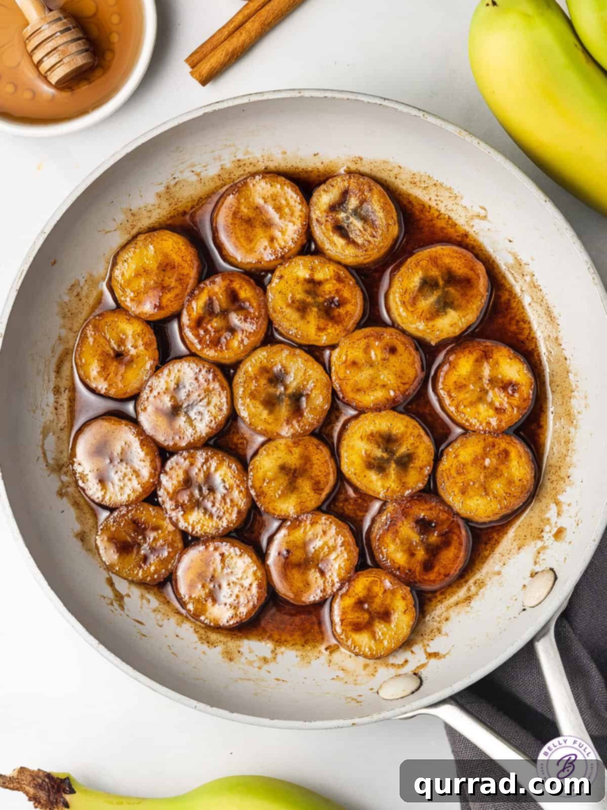 Golden Caramelized Bananas 5 Honey, water, brown sugar, and cinnamon being whisked together for a glaze.