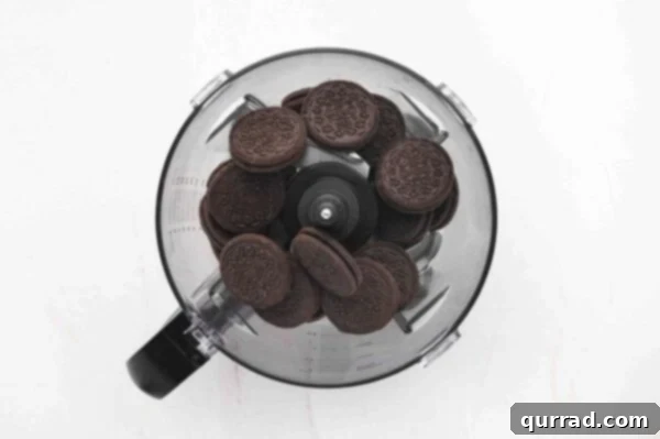 whole oreo cookies in the bowl of a food processor