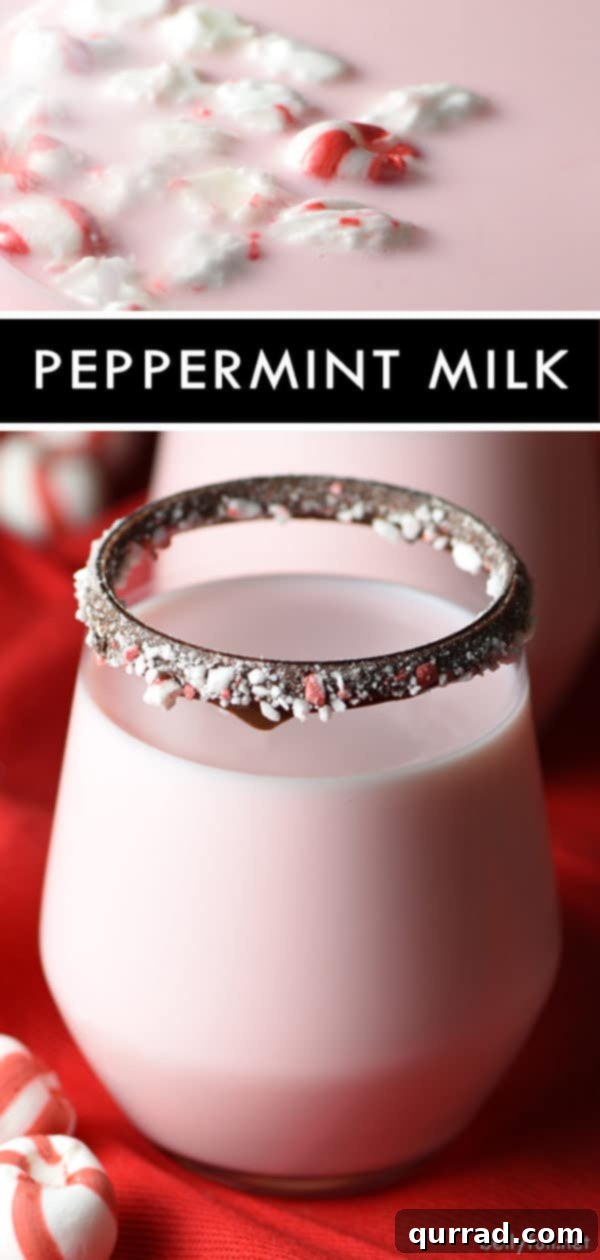 Close-up of pink peppermint milk in a chocolate-rimmed glass, garnished with crushed candies