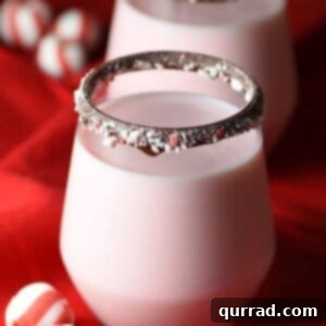 Close-up of pink peppermint milk in a glass