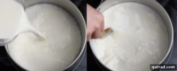 Milk being added to the soaked tapioca pearls in a pot, ready for heating.