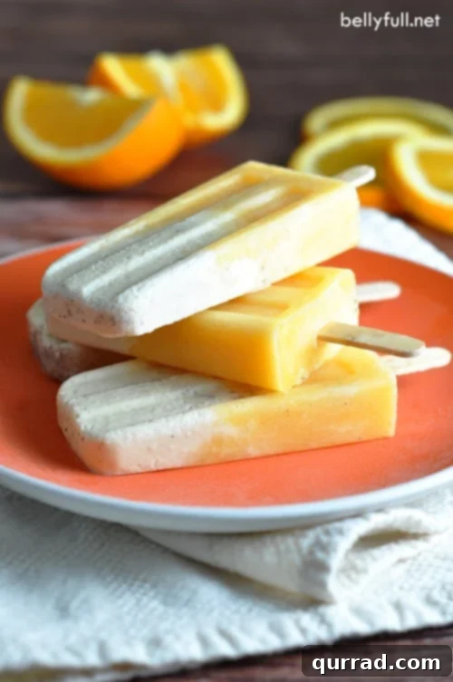 These Orange Creamsicles are the best homemade popsicles from your childhood, with only 4 ingredients! Homemade Orange Creamsicles: Best Childhood Popsicles with Only 4 Ingredients!