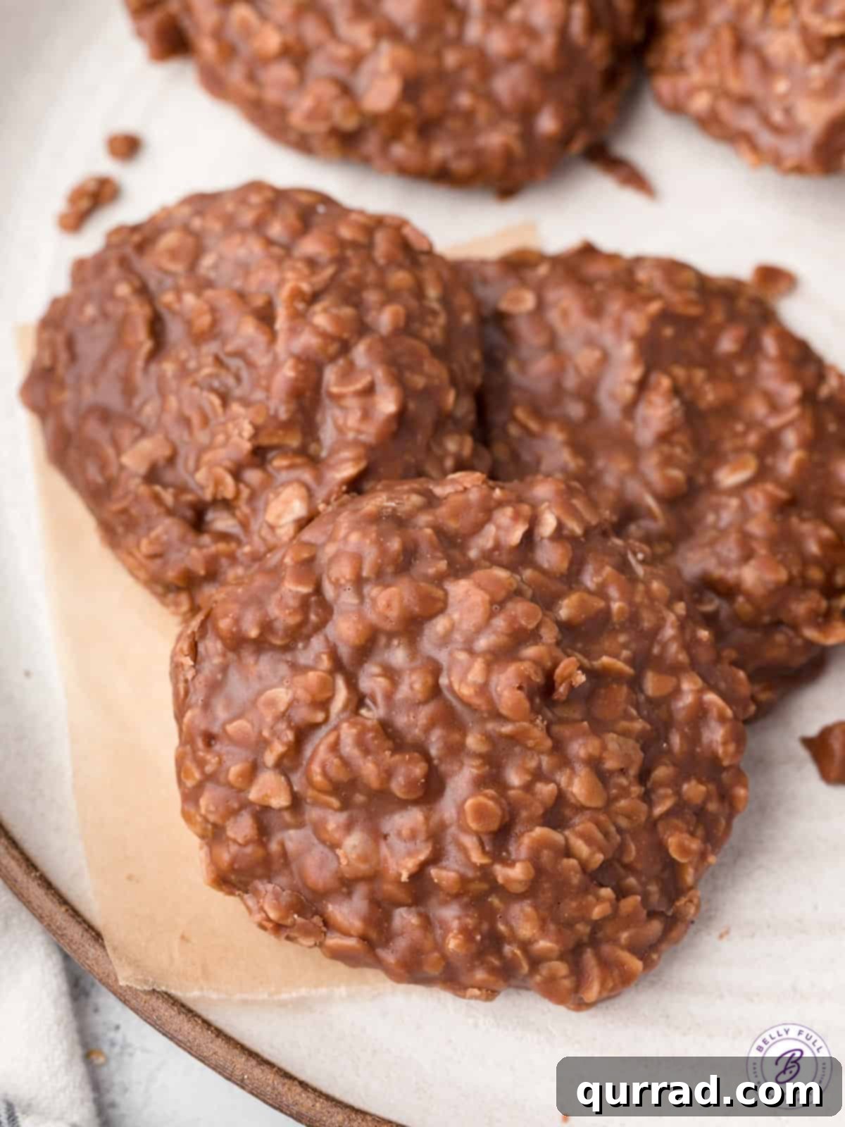 Effortless Chocolate Treats 4 A generous serving of chocolate no bake cookies arranged beautifully on parchment paper