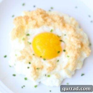 Pillowy Baked Eggs 5 overhead cloud egg garnished with fresh chives