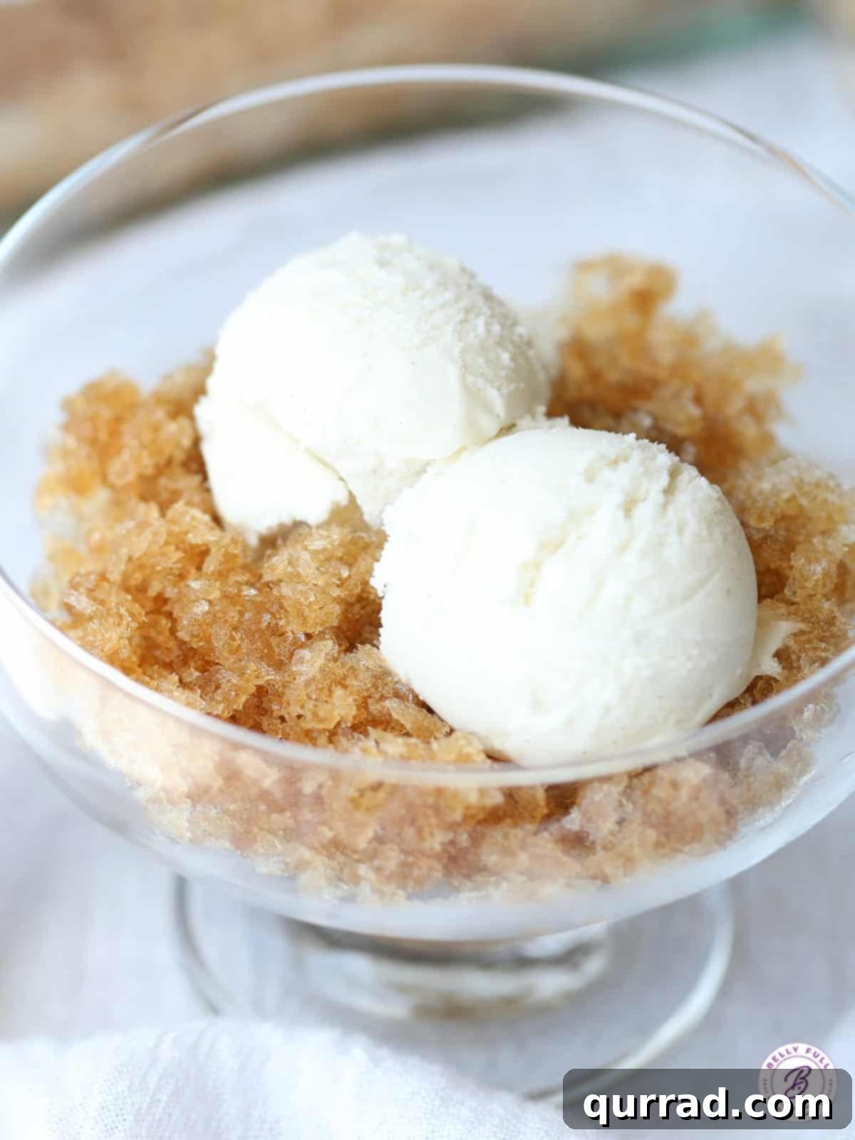 Frosted Root Beer Bliss 4 root beer granita with vanilla ice cream in glass bowl
