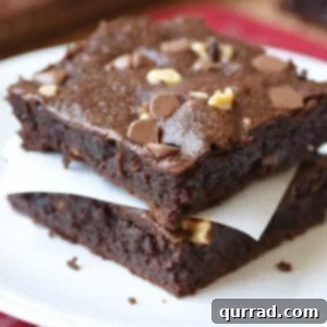 Irresistibly Fudgy Brownies 3 2 stacked fudgy brownies on plate