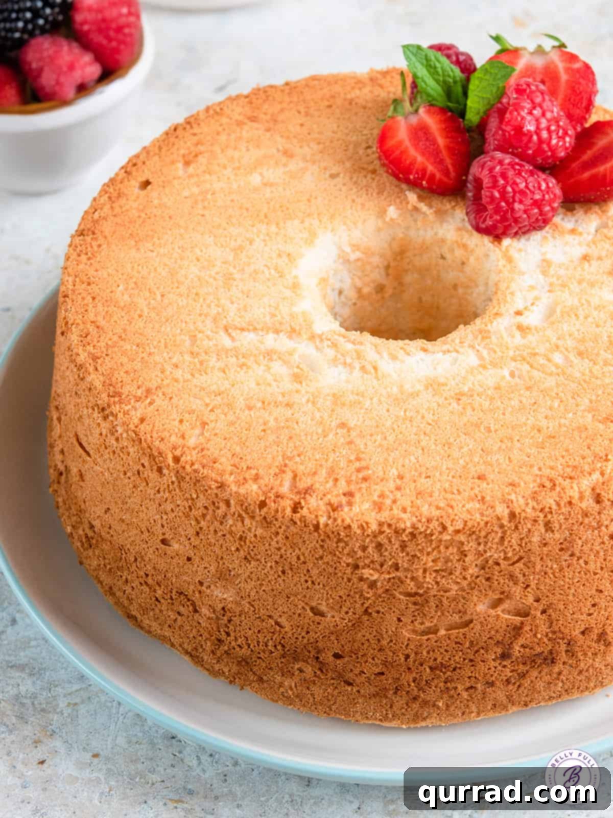 Whisper-Light Angelic Dessert 2 close up round angel food cake on plate