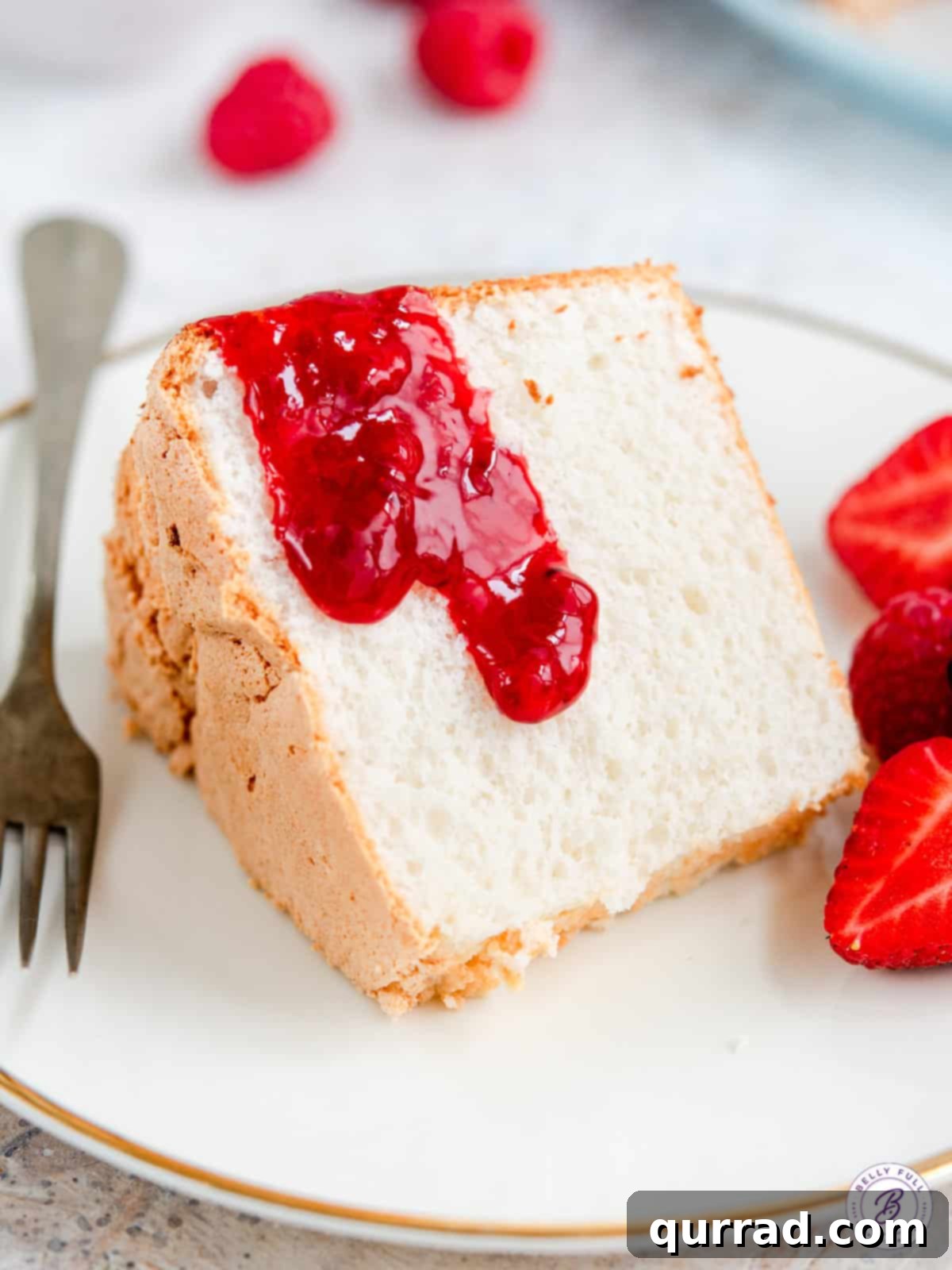 Whisper-Light Angelic Dessert 5 slice of cake with strawberry sauce