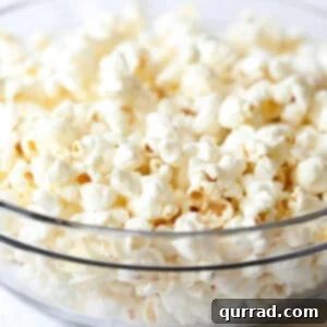 A smaller image of a bowl of fluffy popped popcorn.