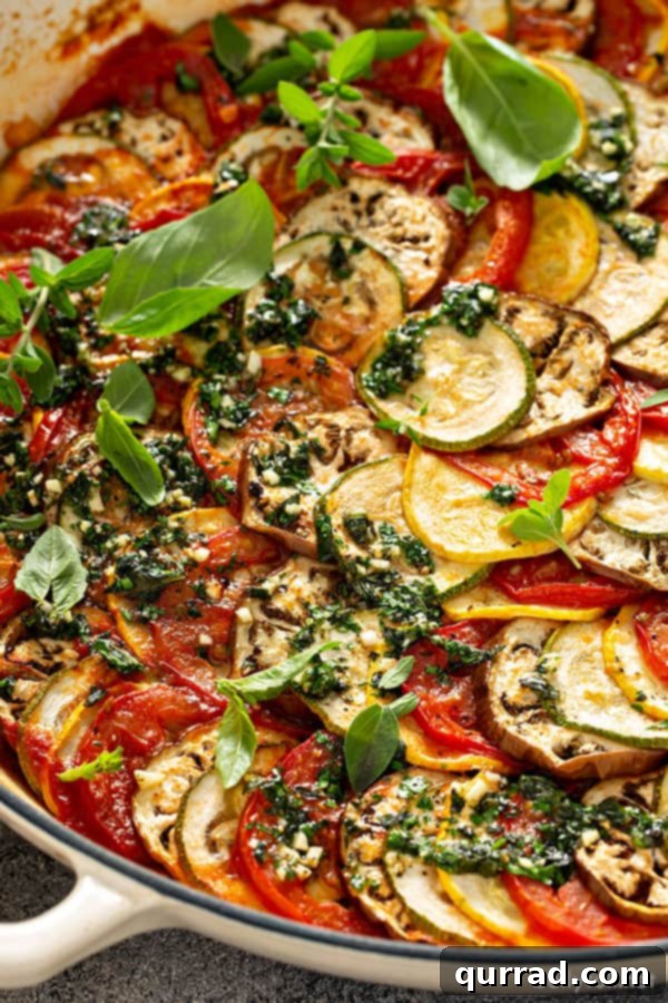 Provencal Ratatouille Delight 3 Close-up of cooked Ratatouille recipe, showcasing tender, colorful vegetables and rich tomato sauce