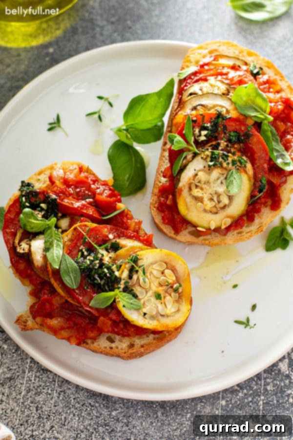 Provencal Ratatouille Delight 6 Portions of roasted garden vegetables served on toasted bread on a white plate