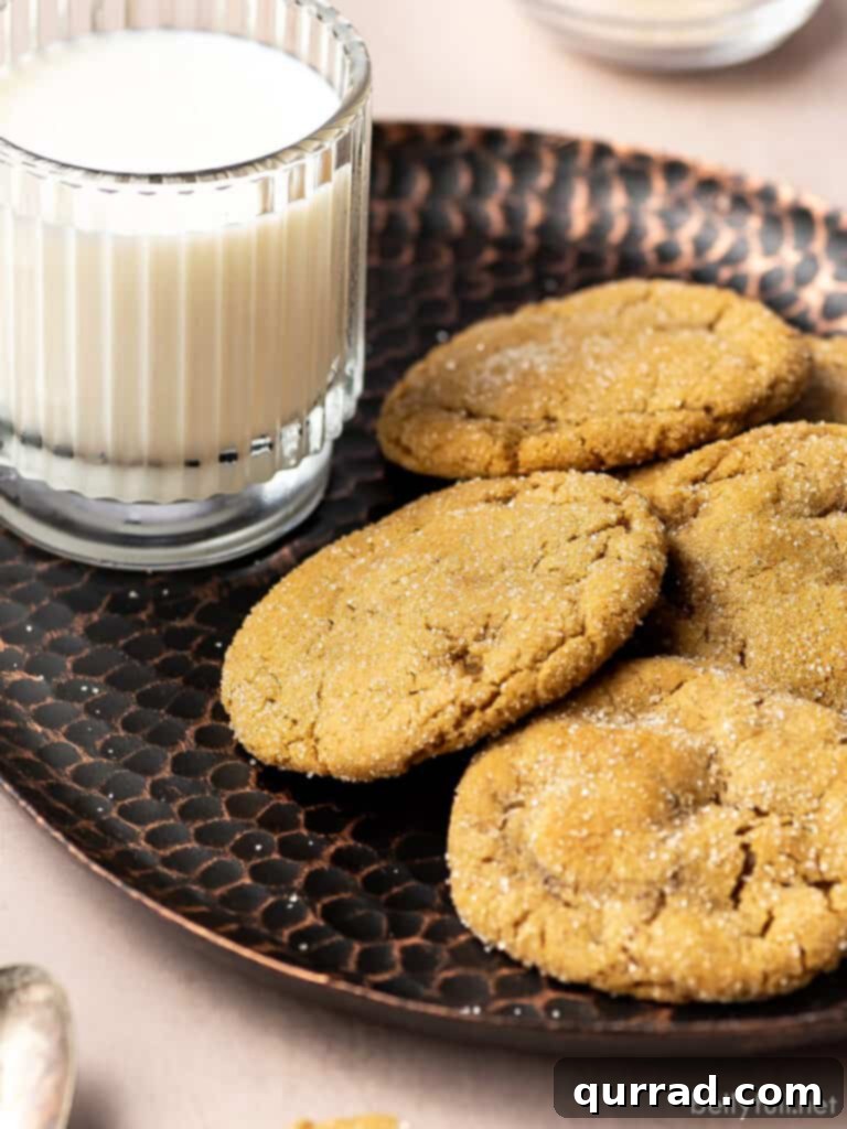 Spiced Molasses Chews 5 molasses cookies on serving tray with glass of milk