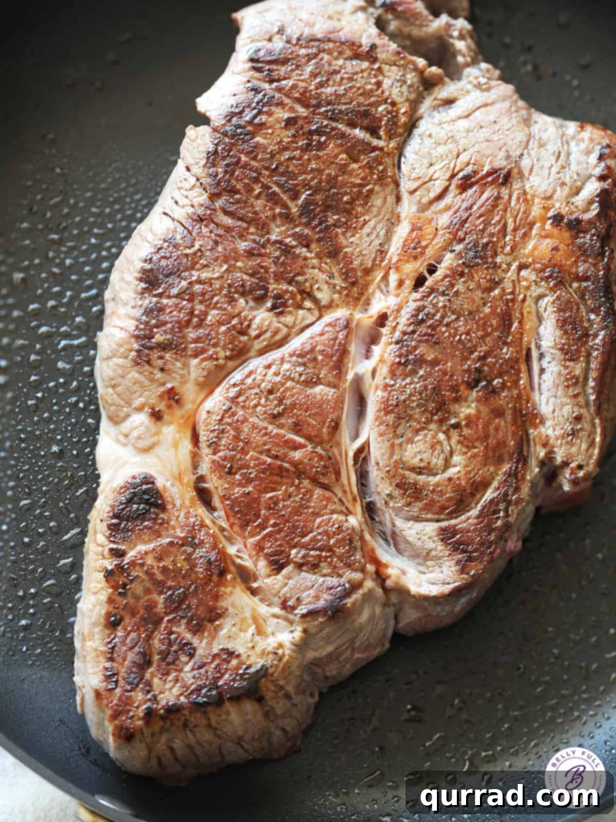 Seared chuck roast, beautifully browned and ready for slow cooking