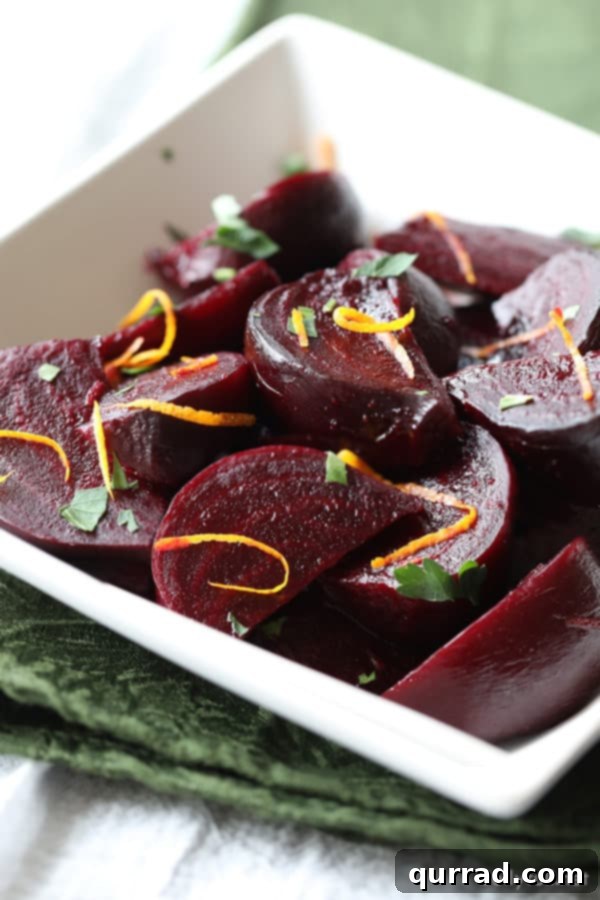 Zesty Maple Roasted Beets 4 Close-up of roasted beets with maple glaze and orange zest, highlighting the vibrant colors and glaze texture.