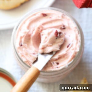Sweet & Tangy Cranberry Honey Butter 5 tiny knife with scoop of cranberry butter